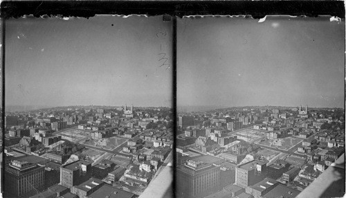 Looking from L.C. Smith Bldg. over Seattle Business and Residential Sections; Catholic Church in Distance. Seattle, Wash