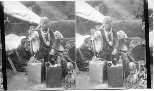 Nepalese girl selling standard Co’s Kerasene - Darjeeling. India