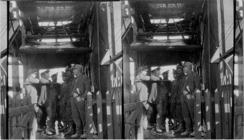 In the cage, top shaft, miners ready to go down the mine to work. Scranton, Pa. (Men moved. Use 84008)