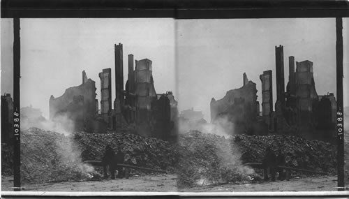 Dismal ruins of the burned city on North Street showing the remains of Deposits. Baltimore Fire