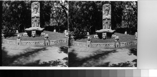 Replicas of the monoliths and temples found at the archaeological site of Copan adorn one of the city's many parks, Parque Concordia. Reproduced in miniature, they are faithful copies in detail of the originals of the ancient Mayans who lived in this land. Tegucigalpa, Honduras, C.A