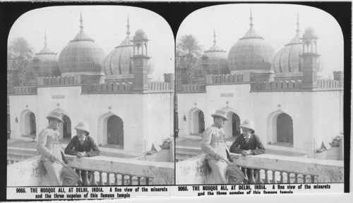 Inscribed in recto: 9065. THE MOSQUE ALI, AT DELHI, INDIA. A fine view of the minarets and the three cupolas of this famous temple