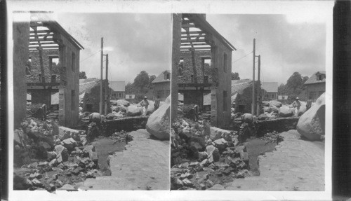 Principal Street of Basse Pointe. Boulders Brought in Mud Torrent From Mont Pelee's Eruption. Martinique