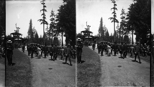 The British on the left & U.S. Marines on the right. U.S. Marines carry arms & the flag both. Canada. Vancouver (?)