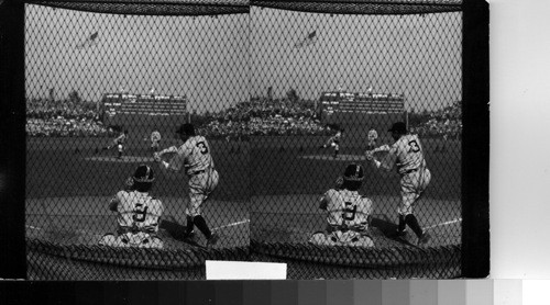 Look it that ball coming over. It landed in the left field bleachers--Home-Run Territory, Twenty minutes later, with two men on base, Ruth knocked a home run into the same bleachers (this shot just before the game). World Series, 1932