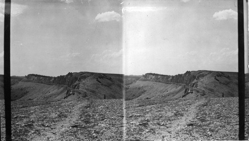 Medicine Mt. Wheel on Top near Cliff, Travoix Trail in Foreground. Wyoming