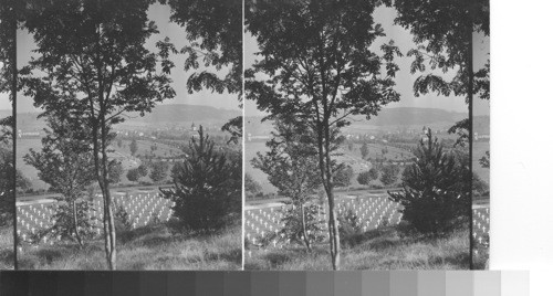 From the hill overlooking cemetery and Belleau Village. Reconstructed church beyond it. Water tower at the extreme left. Looking north