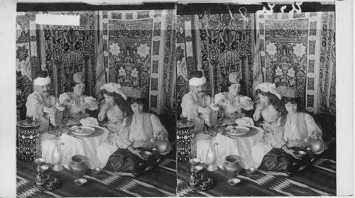 Feasting in the Harem, typical costumes and furniture, Turkey