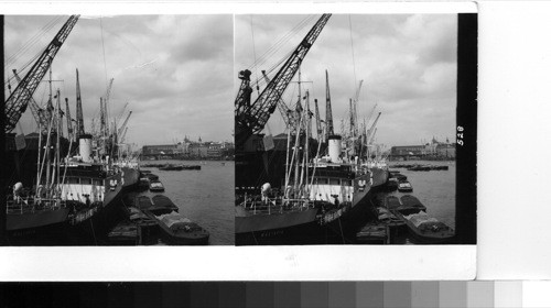 London: The pool of London, one of the important areas of the port of London. These ships are tied up along the Thames wharves just below the tower bridge and are discharging cargo and taking other on board for their return journeys to the many ports from which they come