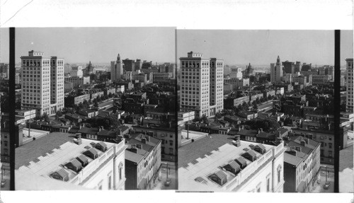 From Washington Monument in Mt. Vernon Place E. over city of Baltimore, at left Standard Oil Bldg. in background, the new city hall