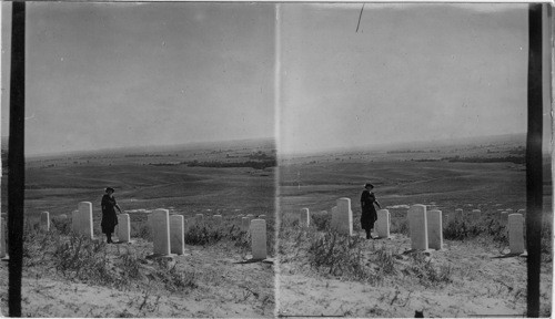 Custers last stand H.D.G. touches marker of Gen. Custer. Mont