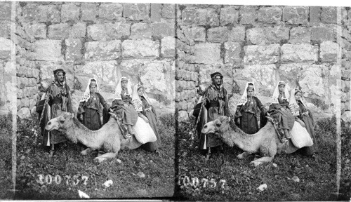 A party from Bethlehem by the walls of Old Jerusalem. Palestine