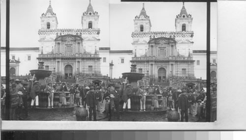 The usual crowd about the fountain in the market square before Church of S. Francis. Quito, Ecuador