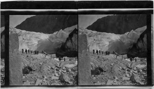 Tourists viewing ice cave, Mendenhall Glacier, Juneau, Alaska, reached by automobile highway from Juneau