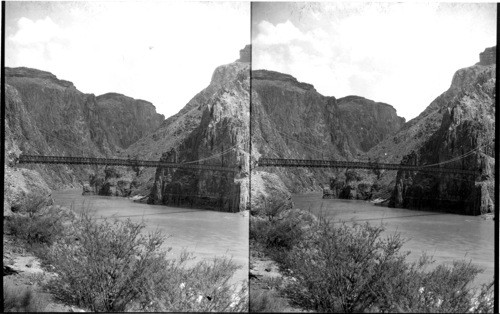 The Kaibab Suspension Bridge, looking up Granite Gorge of Colorado River. Grand Canyon, Arizona