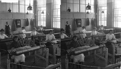 "Picking the cloth" after weaving - scene in a modern silk mill, Paterson, New Jersey