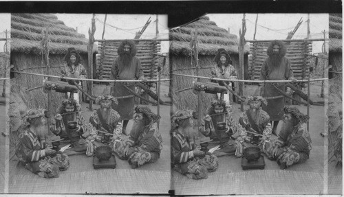 Ainu men, the aborigines of Japan in feast attire, Island of Yezo