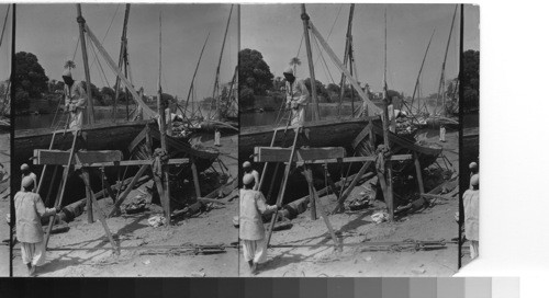 Boat building on the banks of the Nile, Cairo, Egypt. December 1932 service