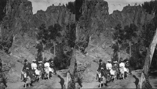 "A vale where the sun beams underlie." On the trail to Seven Falls - Cheyenne Canyon. Colo. Good neg. Clothes Obsolete. P.B. took this over