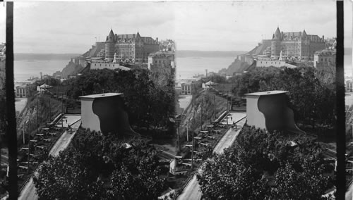 Romantic old town and frowning citadel, view up St. Lawrence from Laval University. Quebec. Canada