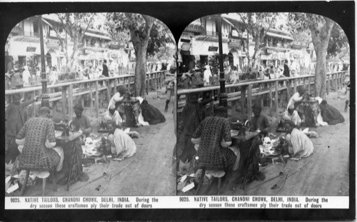 Inscribed in recto: 9025. NATIVE TAILORS, CHANDNI CHOWK, DELHI, INDIA. During the dry season these craftsmen ply their trade out of doors