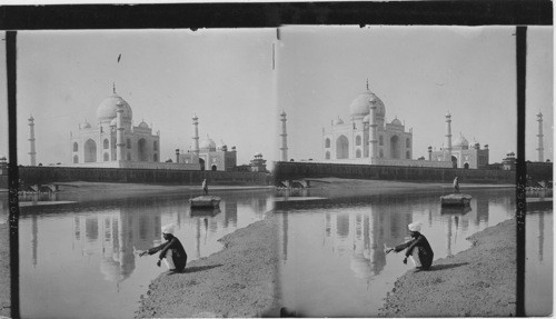 The Taj Mahal most magnificent memorial of the Mogul dynasty, reflected in the waters of the Jumma River. Agra, India