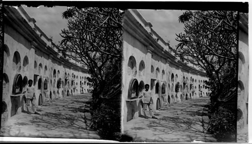 Paco Cemetery - each oval opening in the wall is a tomb, Manila, Philippine Islands