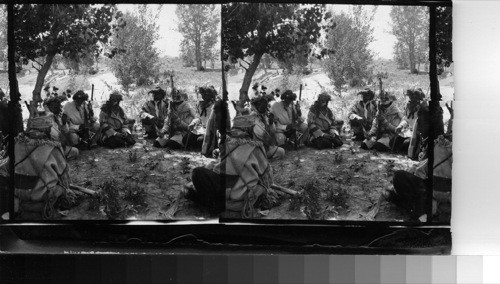 Priests seated about Tree during Ceremony. Fort Belknap Reservation, Mont., July 1906