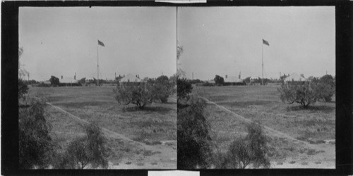 Ft. Clark at Brackettsville, Texas. The building to the left of the flag pole is the Post Headquarter's Building. It was in and around this Ft. that the Texas Rangers experienced some of their earliest activities in corralling the Indians