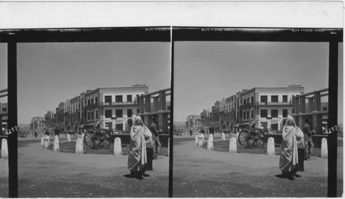 297 Lucky shot of a veiled woman in the streets of Kabul. She wears the chador with the lace inset for the eyes. The chador covers her from head to foot