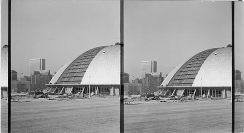 Pittsburgh, Pa. Auditorium "Under the Stars" Dome Rolls open for summer concerts. U.S. Steel? and Penn Sheraton Bldg. in background