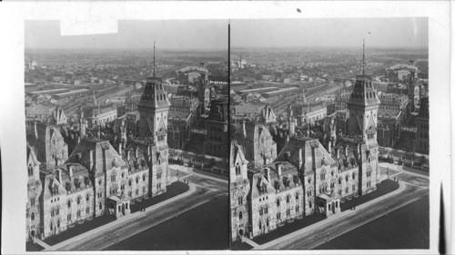 The Dominion's Capitol Ottawa; S.E. from Parliament Building Over E. Wing. P.O. and Canal. Ottawa. Canada