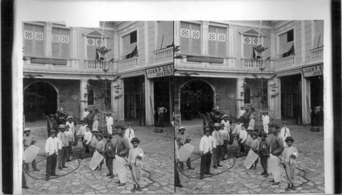 Volunteer firemen ready to rum with the engine, Cathedral Square, Guayaquil, Ecuador