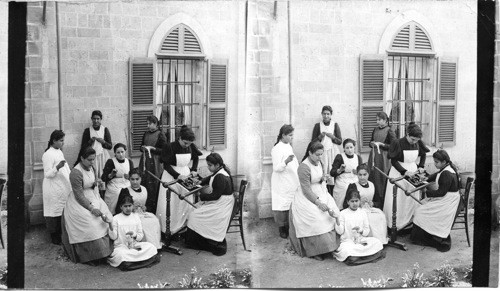 Sewing class in Miss Arnat’s School Jaffa. Palestine