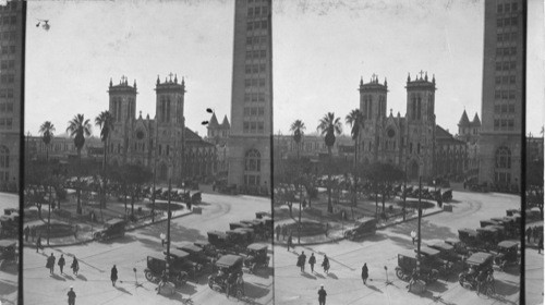 "Main Plaza" Southwest to San Fernando Cathedral, two cone shape tower in back is City Hall, high bldg. at right is National Bank, San Antonio, Texas. Main Plaza and San Fernando Cathedral, City Hall and National Bk. San Antonio, Texas