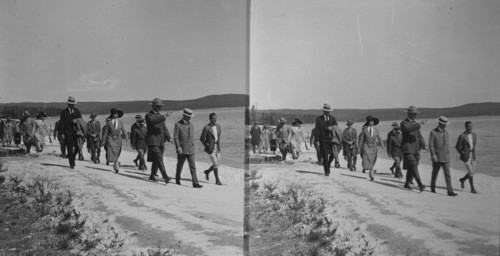 President Coolidge and Party walking along the shore of Lake Yellowstone