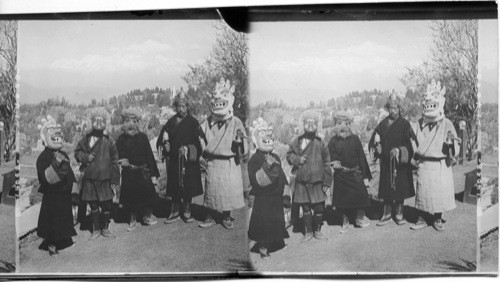 Tibetan devil dancers, who guarantee to drive away the evil one, Darjeeling, India