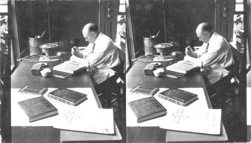 Book to be Presented to Pres. Coolidge, bound by the Roycrofters of East Aurora, N.Y. Incorrect - have my descriptive title given on this print. This shows artist working on a book to present to the President - The man is not binding the book now, he is "Binding in the design" etc