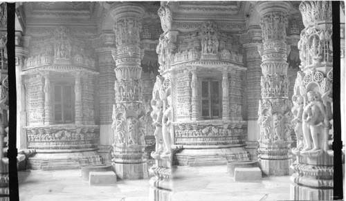 Elaborately carved cell or window on left of entrance to main shrine. India. Nemnath Dilwarra