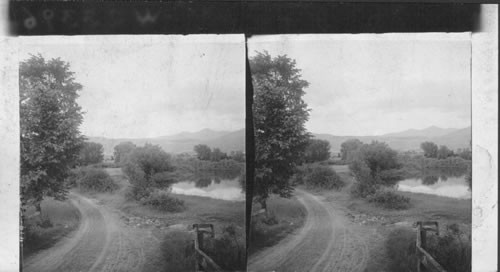 Otter Creek and distant Killington Peaks near Rutland. Vt