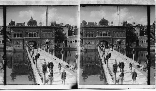 Entrance gate and Cause-way over the sacred tank. Goldne Tmeple, Amritsar, India