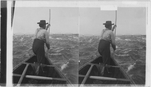 Indian poling canoe up St. Mary's Rapids, Ontario, Mich