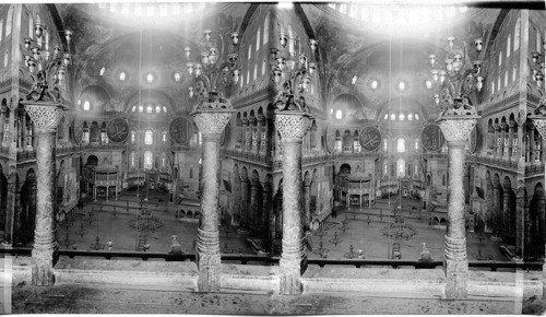 Turks at prayer in St. Sophia Mosque, (originally a church). Constantinople, Turkey