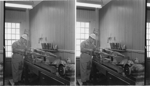 A wood turner making bedstead legs, Cabinet Shop