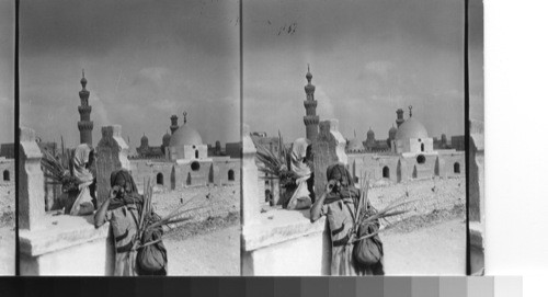 The Arab town dwellers go to the cemetery for many of their festivals, Bairam Celebration in April 1931. Cairo, Egypt