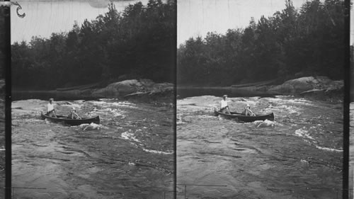 Shooting Rapids with Canoe on Moon River, Muskoka Lake, Canada