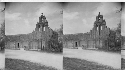 Famous window at San Jose Mission was taken out from wall & sent to St. Louis Expo. and replaced in wall again - fine example of hand carving of ancient times, San Antonio, Texas