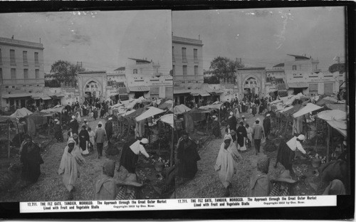 Inscribed in recto: 17,711. THE FEZ GATE, TANGIER, MOROCCO. The Approach through the Great Outdoor Market Lined with Fruit and Vegetable Stalls. Copyright 1912 by Geo. Rose