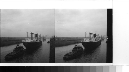 Manchester: freighters on the Manchester ship canal coming in from from the Irish sea and approaching the port. This picture was made on June 30, 1954, just at the time of the total eclipse of the sun