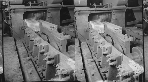 The first rolling process - turning steel ingots into "blooms" for rails. Homestead, Penna